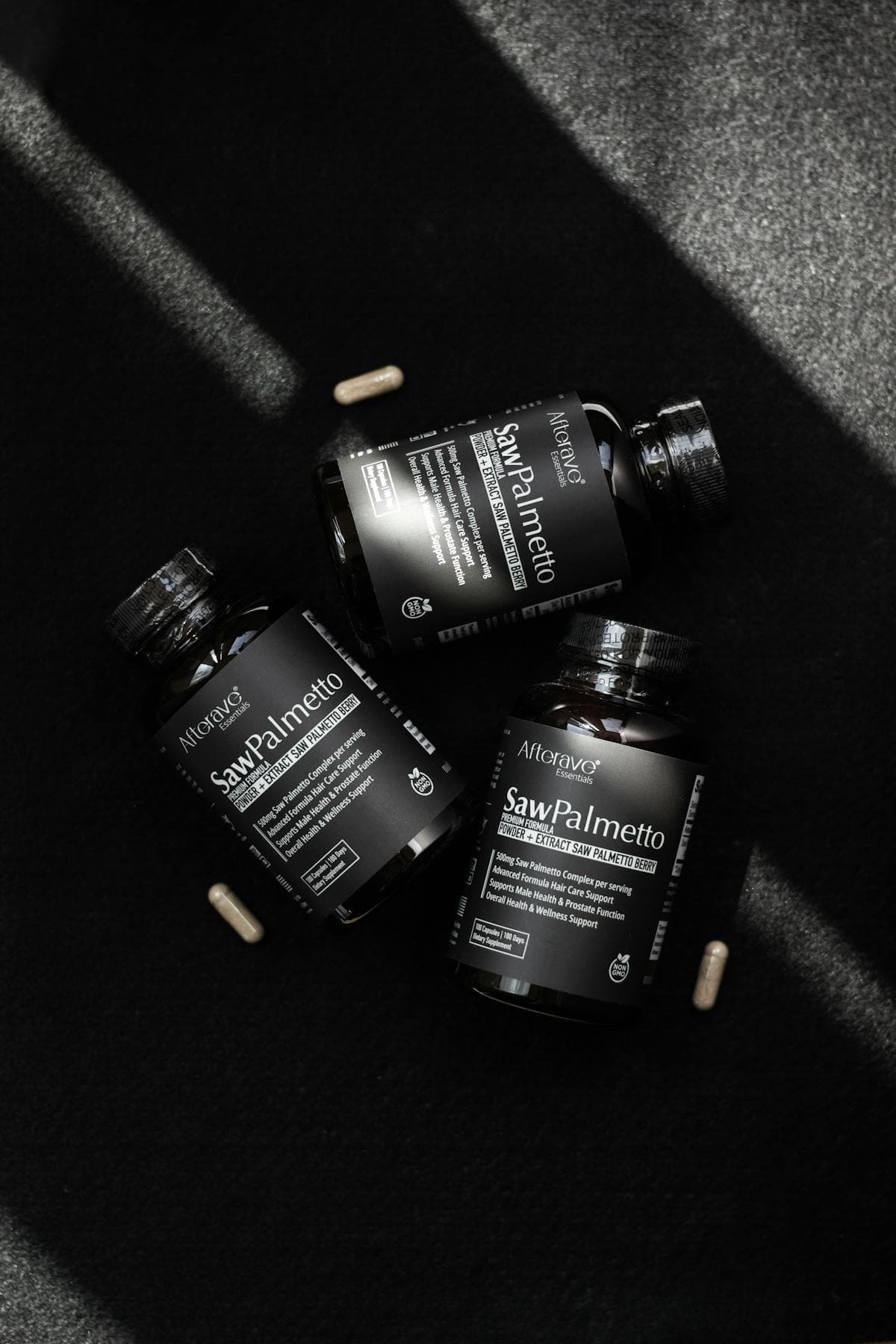 Saw palmetto supplement bottle and capsules